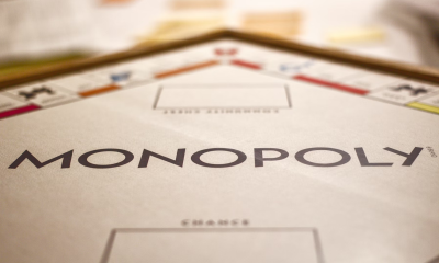 Monopoly board game, laid out on a table.